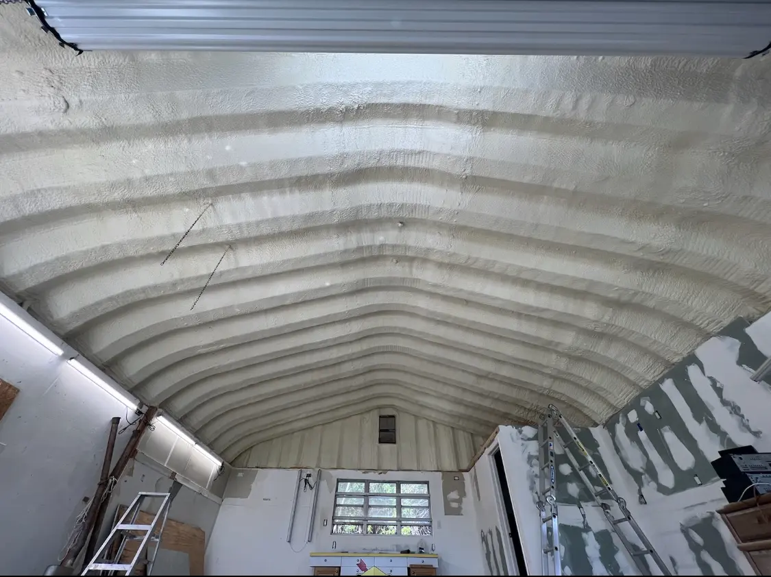 Spray polyurethane foam applied to the underside of a metal roof deck in Palm Springs